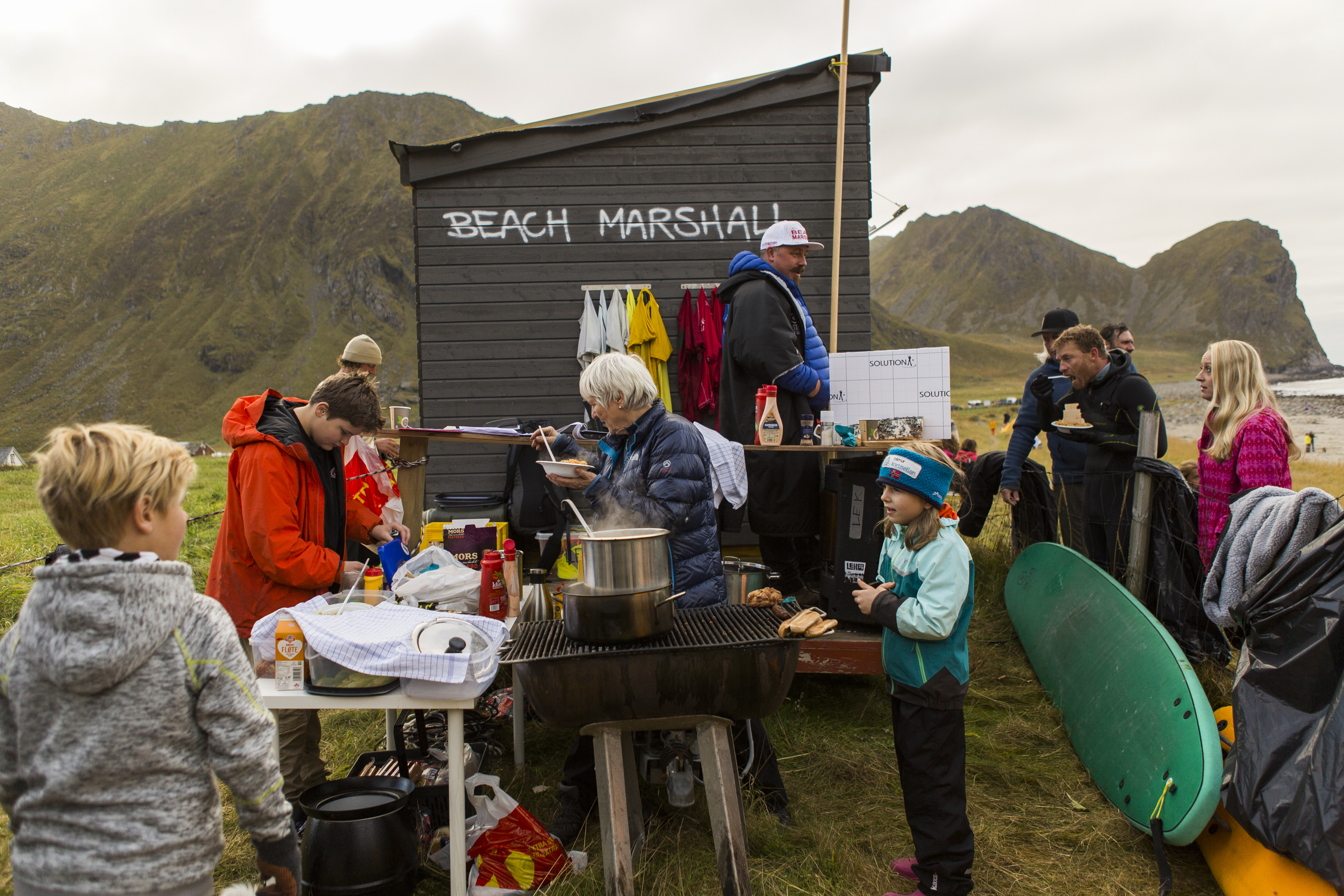 A cookout, including lamb stew, near the beach in Unstad, Norway, Oct. 8, 2016. The Lofoten Masters surfing competition, 6,000 miles North of Hawaii and above the Arctic Circle, is billed as the world's northernmost. ÒEveryone has done the tropics,Ó says Latte. ÒCold water surfing is the new black.Ó (Leslye Davis/The New York Times)