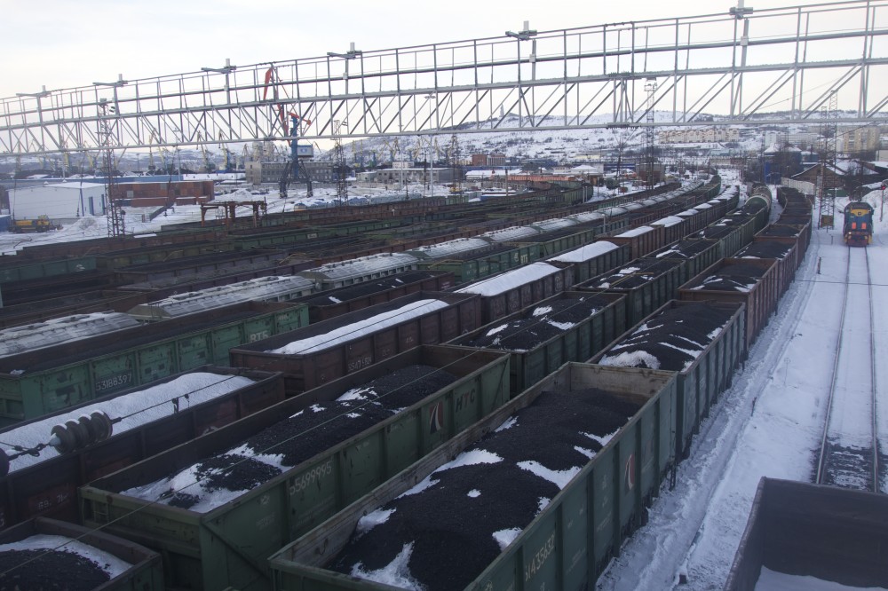 Loads of coal are sent by rail all the way from the Kuzbass region in southwestern Siberia to the port of Murmansk before being shipped to world markets by boats. With a new harbour in Arkhangelsk, linked with a new railway through the Komi Republic, transport distance to a port will be much shorter. (Thomas Nilsen / The Barents Observer)