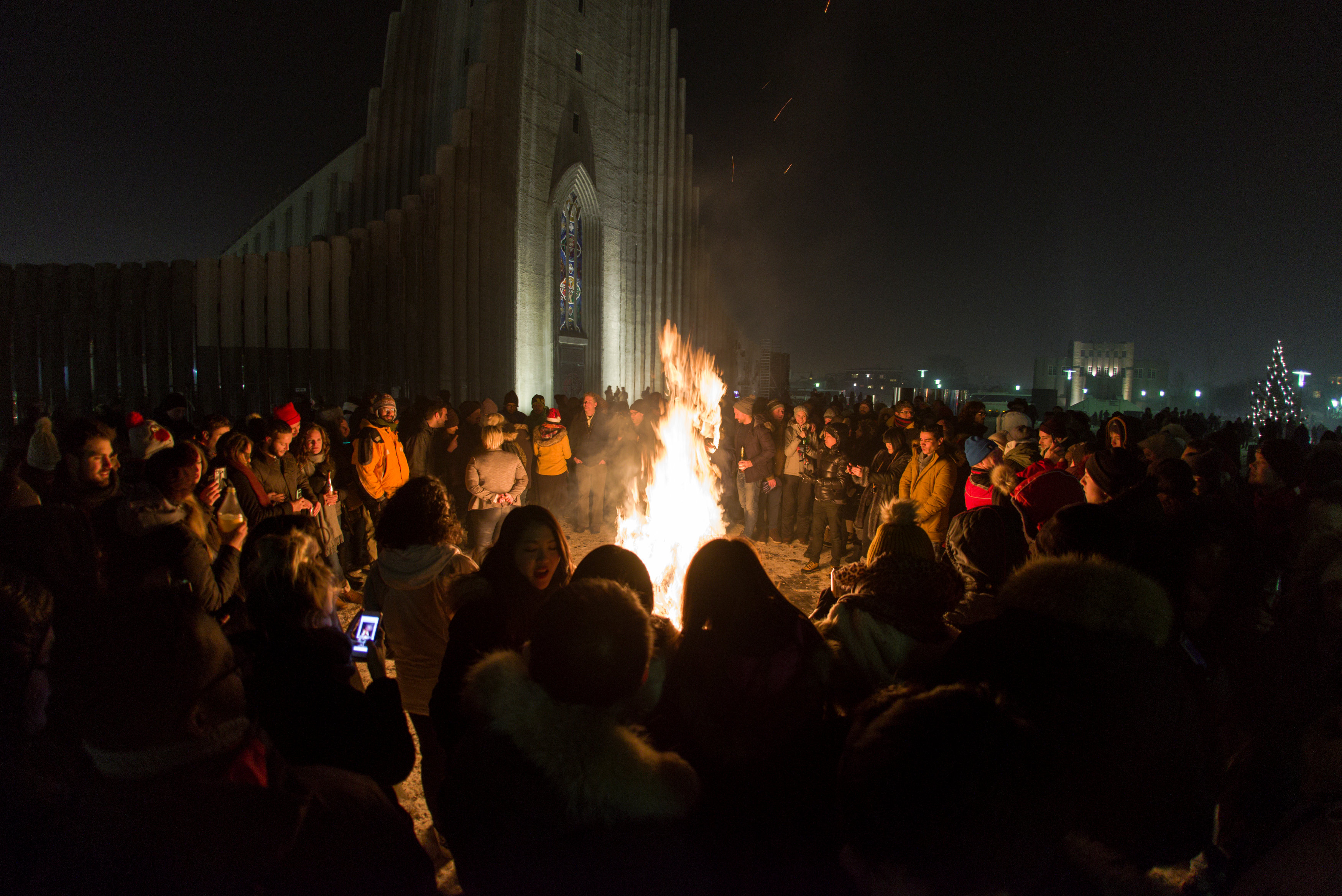 People gather at Hallgrims church to celebrate the New Year in Reykjavik, Iceland, January 1, 2017. (Geirix / Reuters)