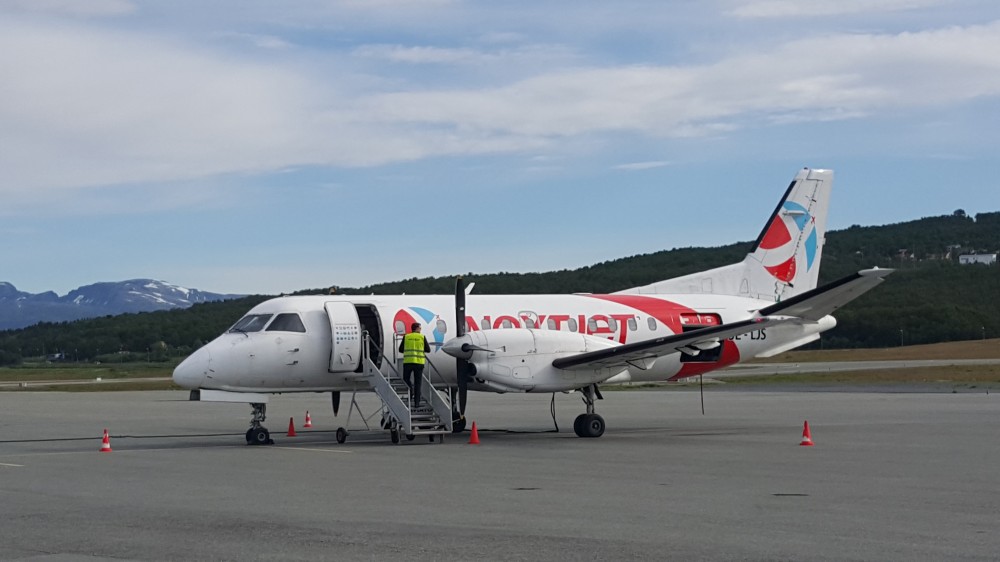 A Nextjet plane at Tromsø airport. The propeller plane currently flies the route linking Tromsø, Luleå and Oulu, but jet aircraft will soon fly that route. (Thomas Nilsen / The Independent Barents Observer)