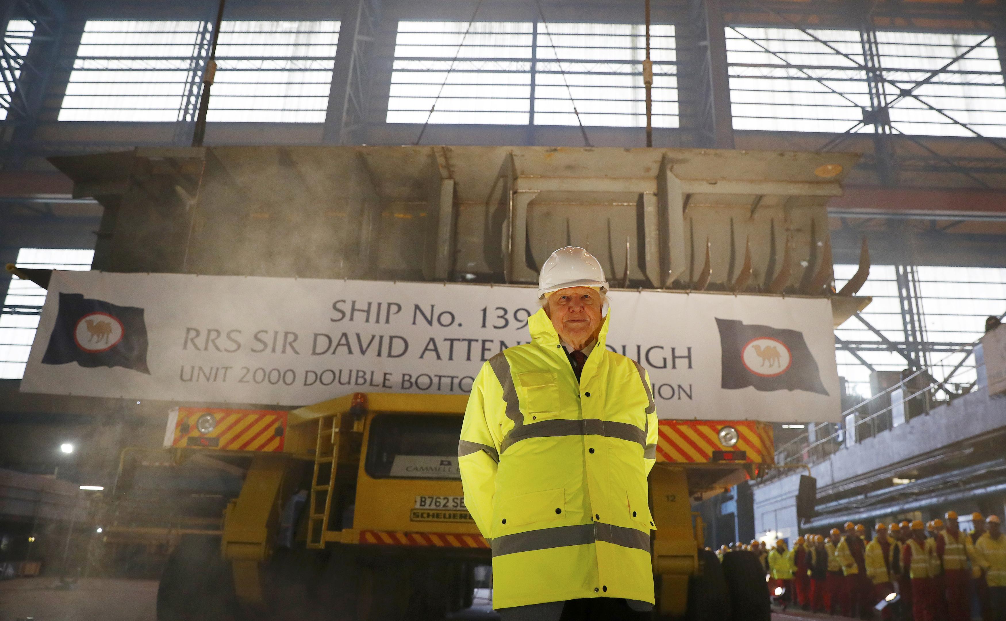 British naturalist and broadcaster David Attenborough stands in front of a section of the keel of the new polar research vessel that will carry his name at a ceremony at the Cammell Laird ship yard in Birkenhead, northern England October 17 , 2016. (Phil Noble / Reuters)