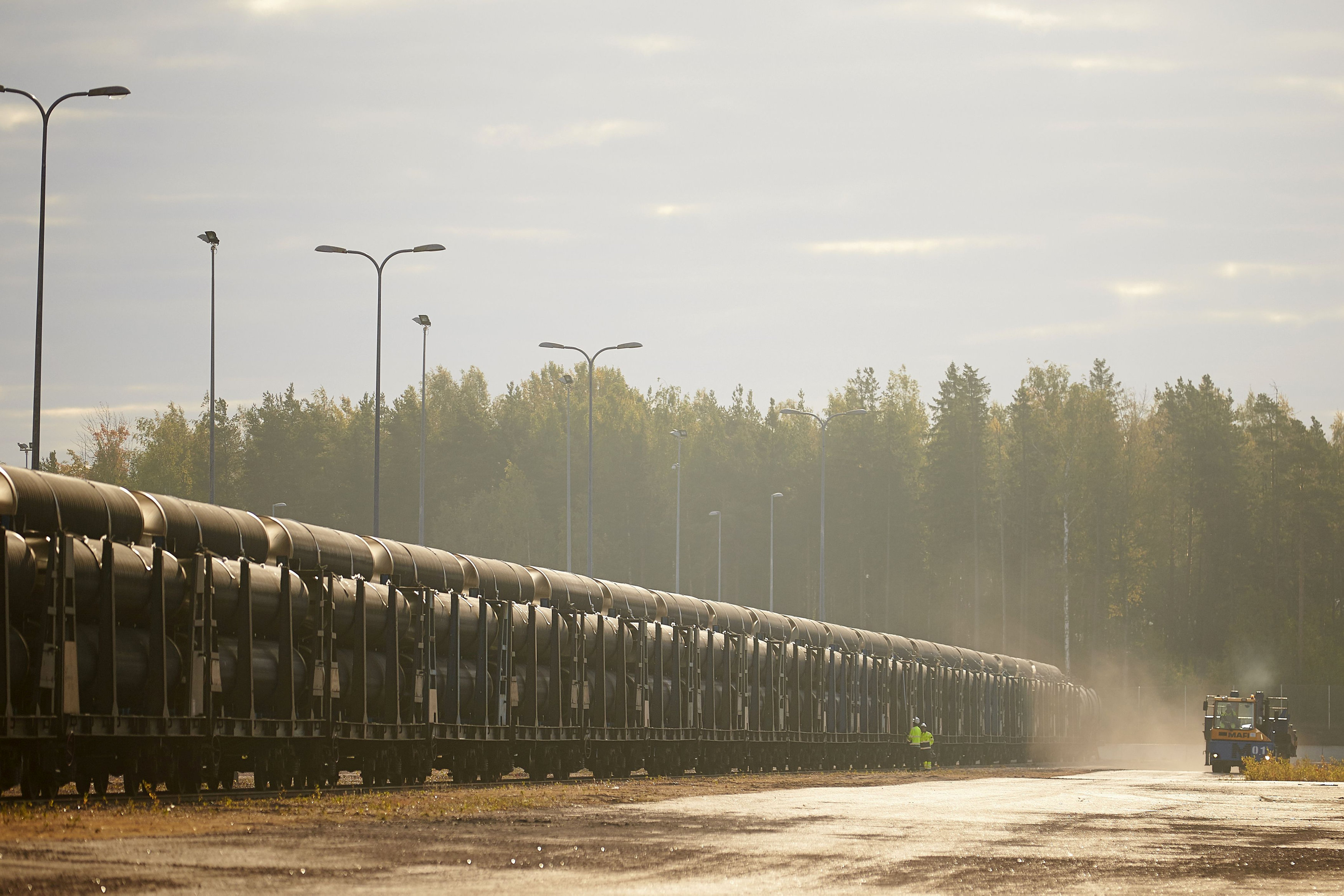 A handout by Nord Stream 2 claims to show the first steel pipes for the Nord Stream 2 pipeline arriving from a plant of OMK, which is one of the three pipe suppliers selected by Nord Stream 2 AG, to a coating plant in Kotka, Finland, in this undated photo provided to Reuters on March 23, 2017.  Axel Schmidt/Courtesy of Nord Stream 2/Handout via REUTERS