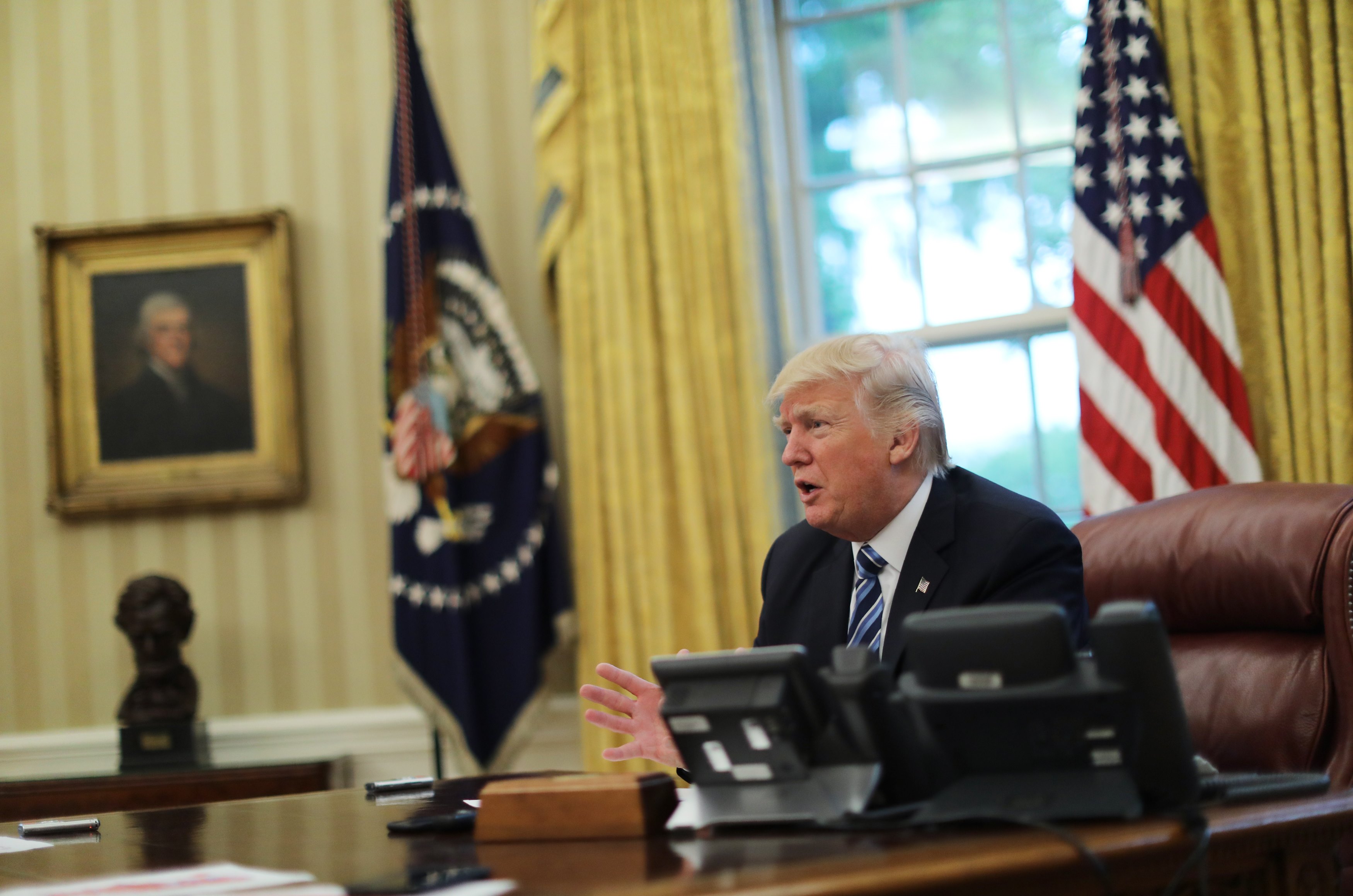 U.S. President Donald Trump speaks during an interview with Reuters in the Oval Office of the White House. (Carlos Barria / Reuters)