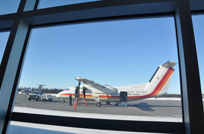 An Air Inuit Dash-8 is pictured parked outside of the Kuujjuaq airport. Quebec will host a regional air transport summit in 2018 to look at ways to make air travel in the province more accessible. (Sarah Rogers / Nunatsiaq News)