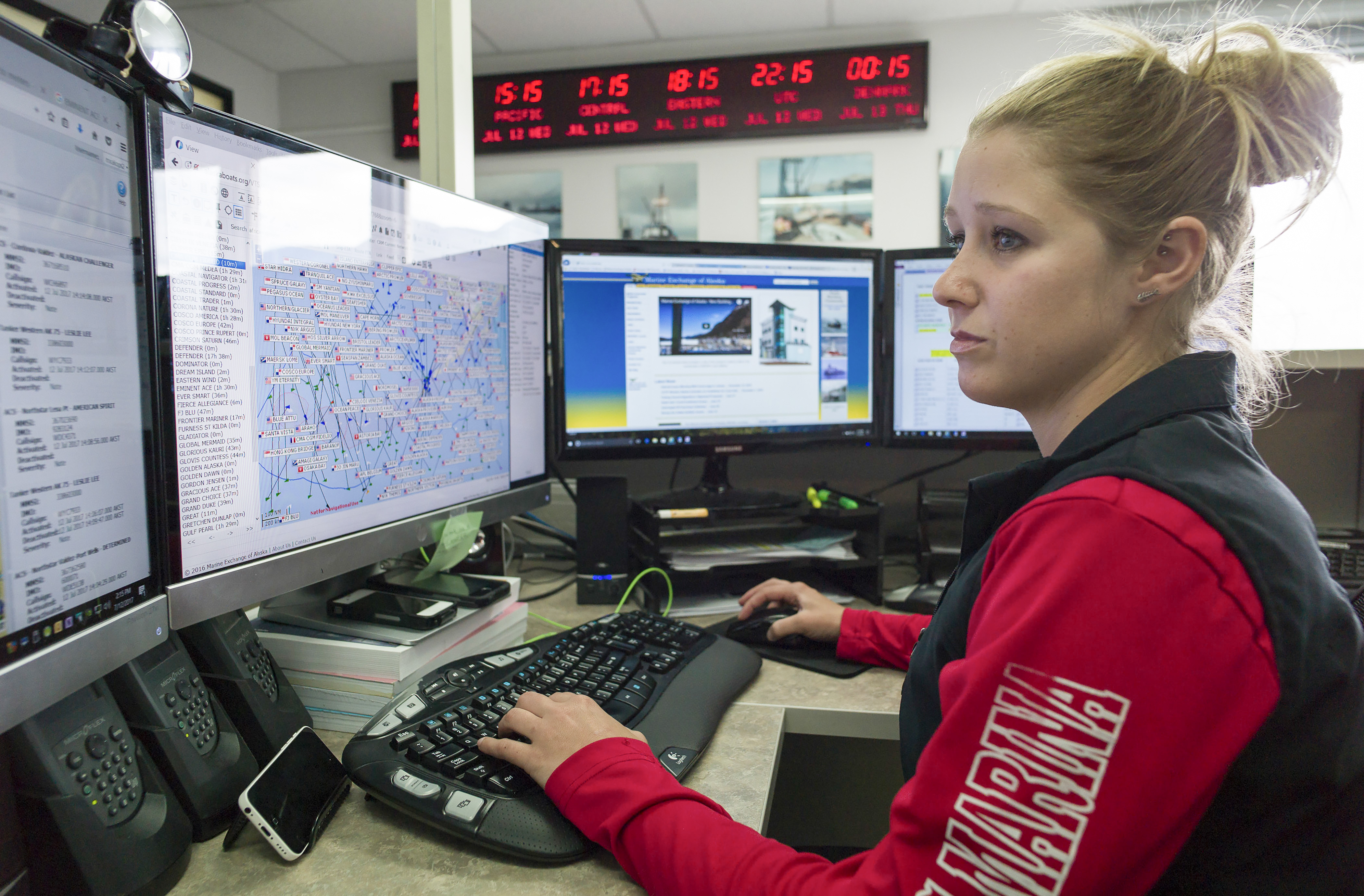 Shelby Martin, a maritime information specialist for the Marine Exchange of Alaska, monitors ship traffic through the state's waters, in Juneau, Alaska, July 12, 2017. As global warming reduces the extent of sea ice in the Arctic, more ships will be plying waters farther north, which raises concerns about ship safety. (Michael Penn / The New York Times)