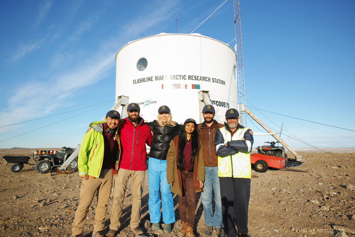 The crew outside station. (Left to right) Yusuke Murakami (Japan), Paul Knightly (USA), Anastasiya Stepanova (Russia), Anushree Srivastava (India), Alexandre Mangeot (France), and Jonathan Clarke (Australia). (Mars Society)