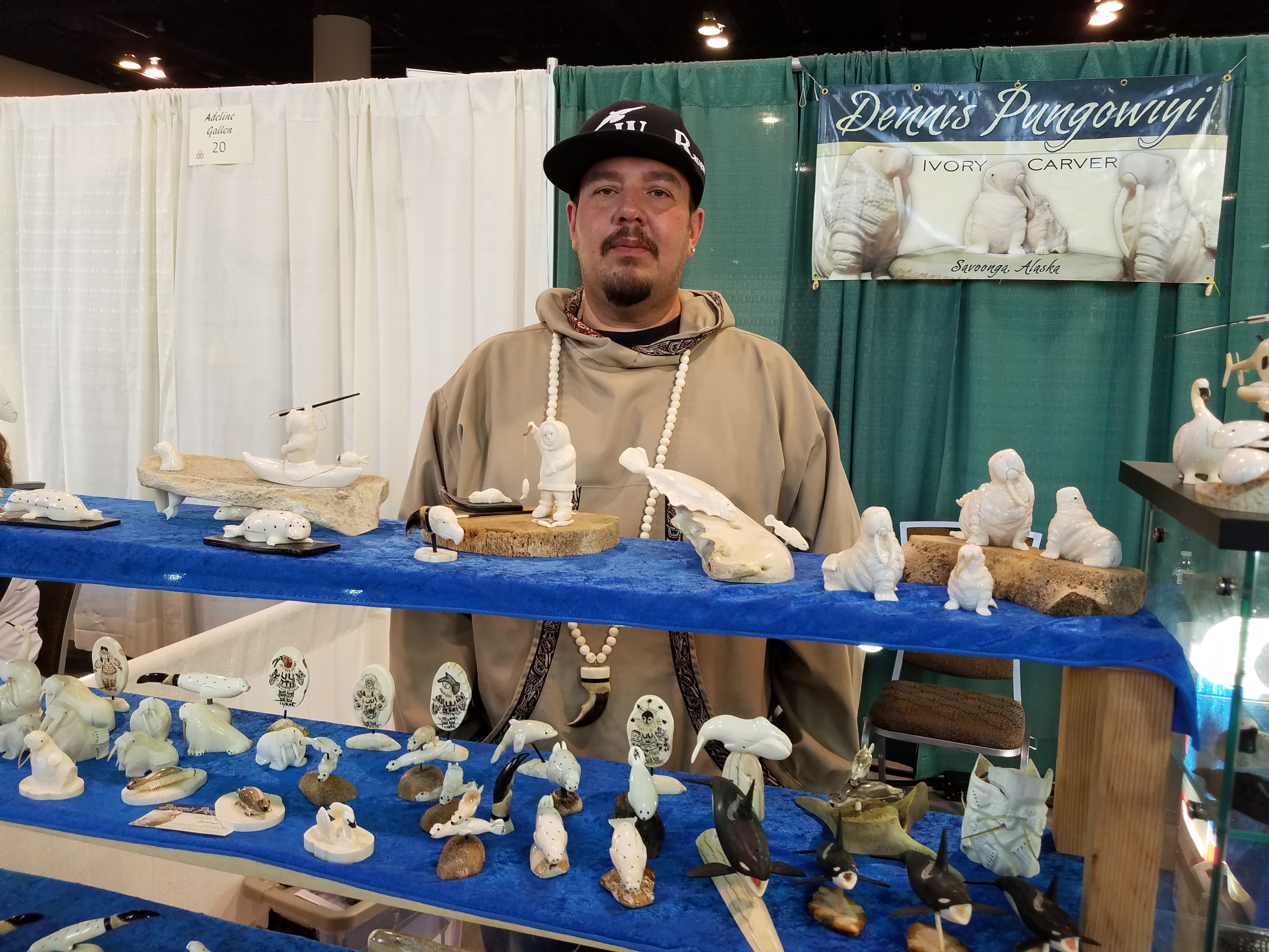 Dennis Pungowiyi, an Alaska Native carver from St. Lawrence Island, said sales of his carvings have decreased sharply as a perception has grown among potential customers that owning one might be illegal. (Yereth Rosen / Arctic Now)