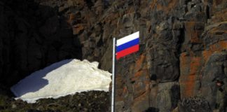Russian military plants a flag on the nation’s northernmost point