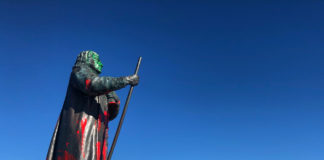 A statue in Greenland is marked with anti-colonial statements
