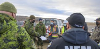 Canadian military sets up water purification units for Iqaluit at the Sylvia Grinnell River